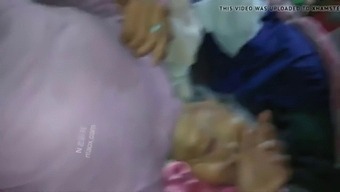 Asian Mature Woman Engages In Anal Play
