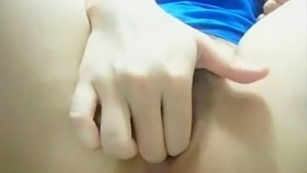 Real Asian Teen Masturbates With Cucumber In Amateur Video
